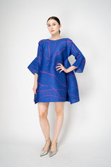 Pleats Please Issey Miyake Pause Contrasting Silhouettes Bounce Tunic Dress in Indigo and Pink Vancouver. Shop Online or in Store.