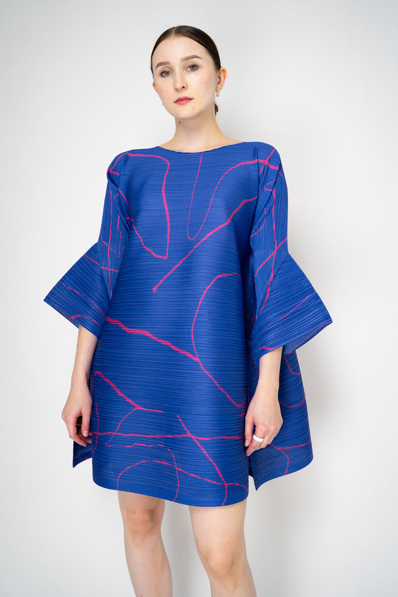 Pleats Please Issey Miyake Pause Contrasting Silhouettes Bounce Tunic Dress in Indigo and Pink Vancouver. Shop Online or in Store.