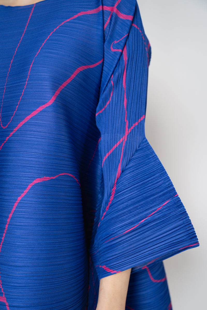 Pleats Please Issey Miyake Pause Contrasting Silhouettes Bounce Tunic Dress in Indigo and Pink Vancouver. Shop Online or in Store.
