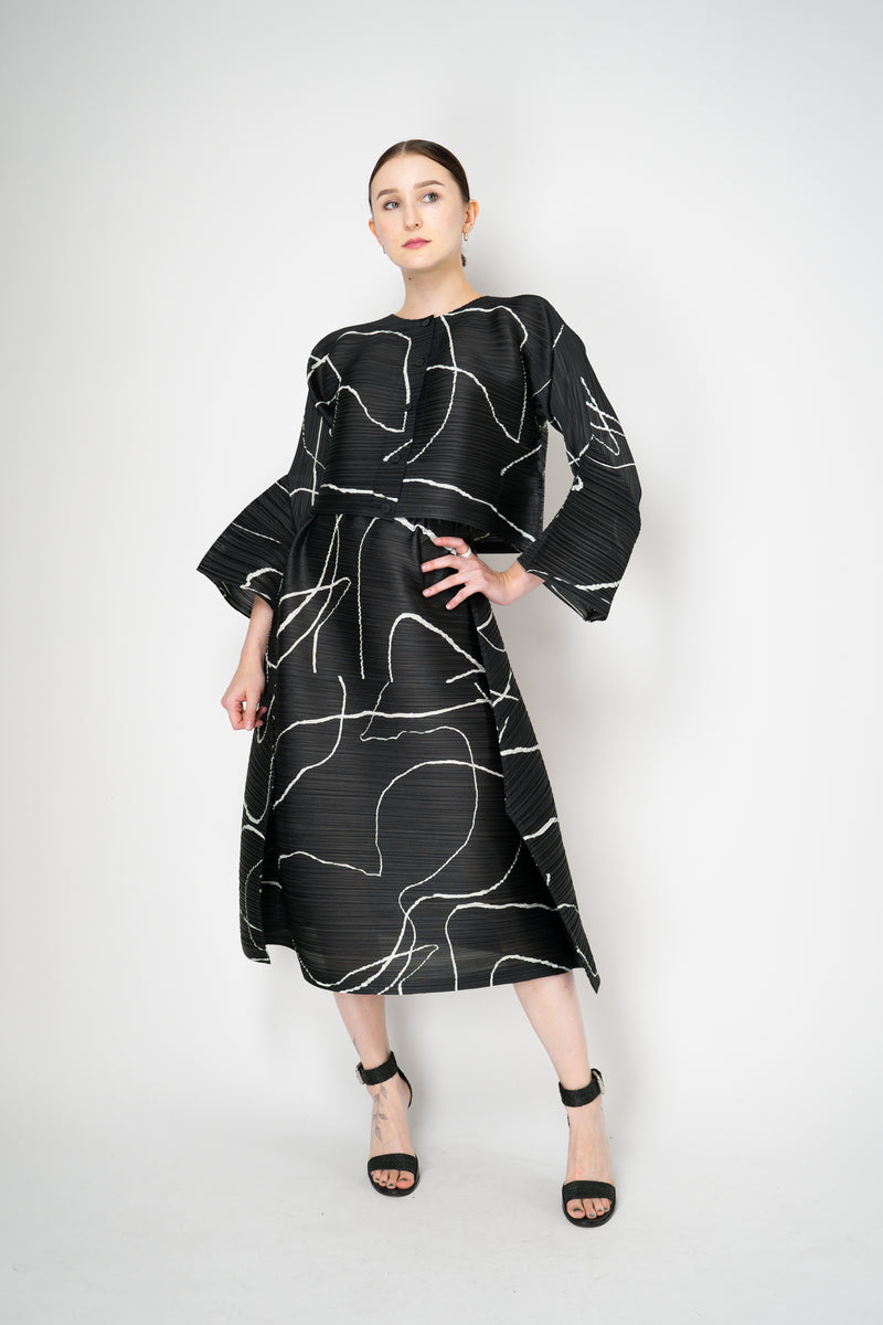 Pleats Please Issey Miyake Pause Contrasting Silhouettes Cropped Cardigan in Black and White Vancouver. Shop Online or in Store.