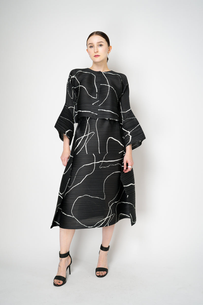 Pleats Please Issey Miyake Pause Contrasting Silhouettes Cropped Cardigan in Black and White Vancouver. Shop Online or in Store.