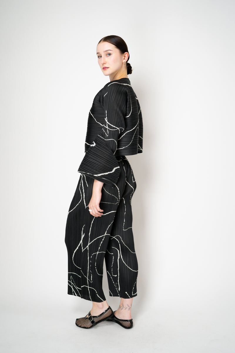 Pleats Please Issey Miyake Pause Contrasting Silhouettes Cropped Cardigan in Black and White Vancouver. Shop Online or in Store.