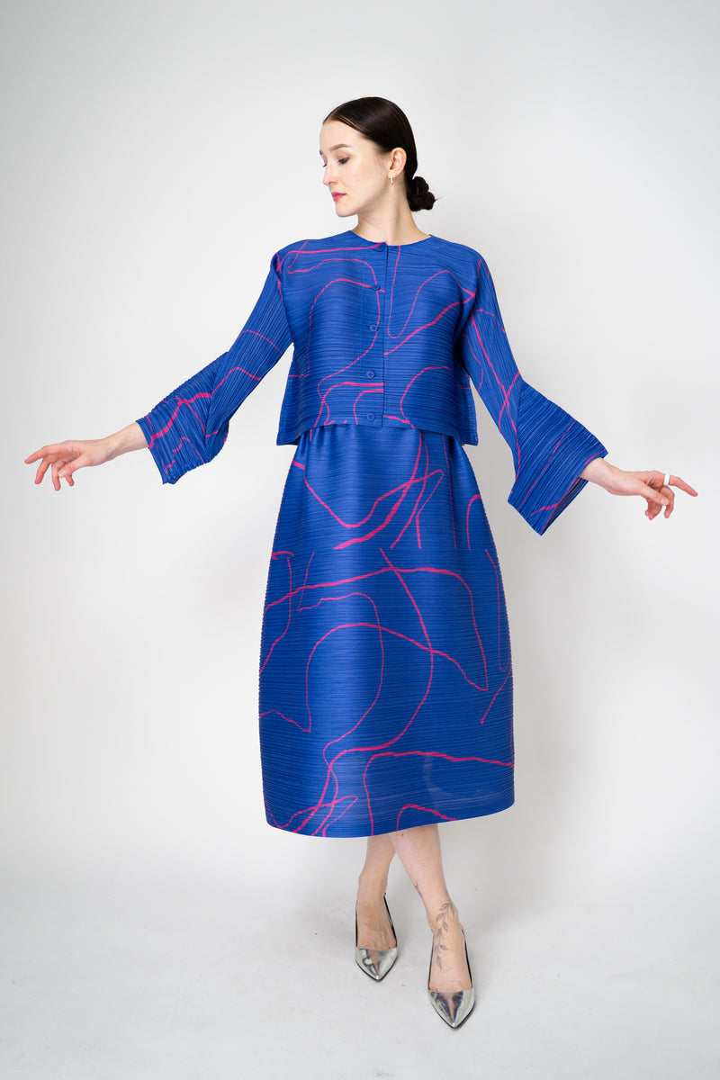 Pleats Please Issey Miyake Pause Contrasting Silhouettes Cropped Cardigan in Indigo and Pink Vancouver. Shop Online or in Store.