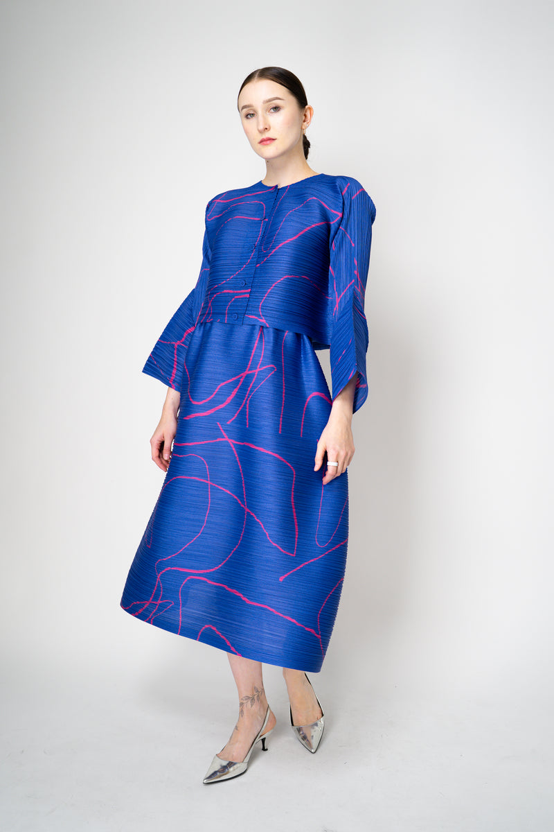 Pleats Please Issey Miyake Pause Contrasting Silhouettes Cropped Cardigan in Indigo and Pink Vancouver. Shop Online or in Store.