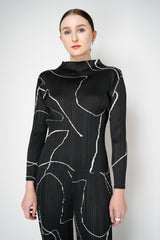 Pleats Please Issey Miyake Pause Contrasting Silhouettes High Neck Long Sleeve Top in Black and White Vancouver. Shop Online or in Store.