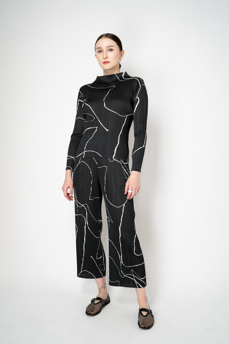 Pleats Please Issey Miyake Pause Contrasting Silhouettes High Neck Long Sleeve Top in Black and White Vancouver. Shop Online or in Store.