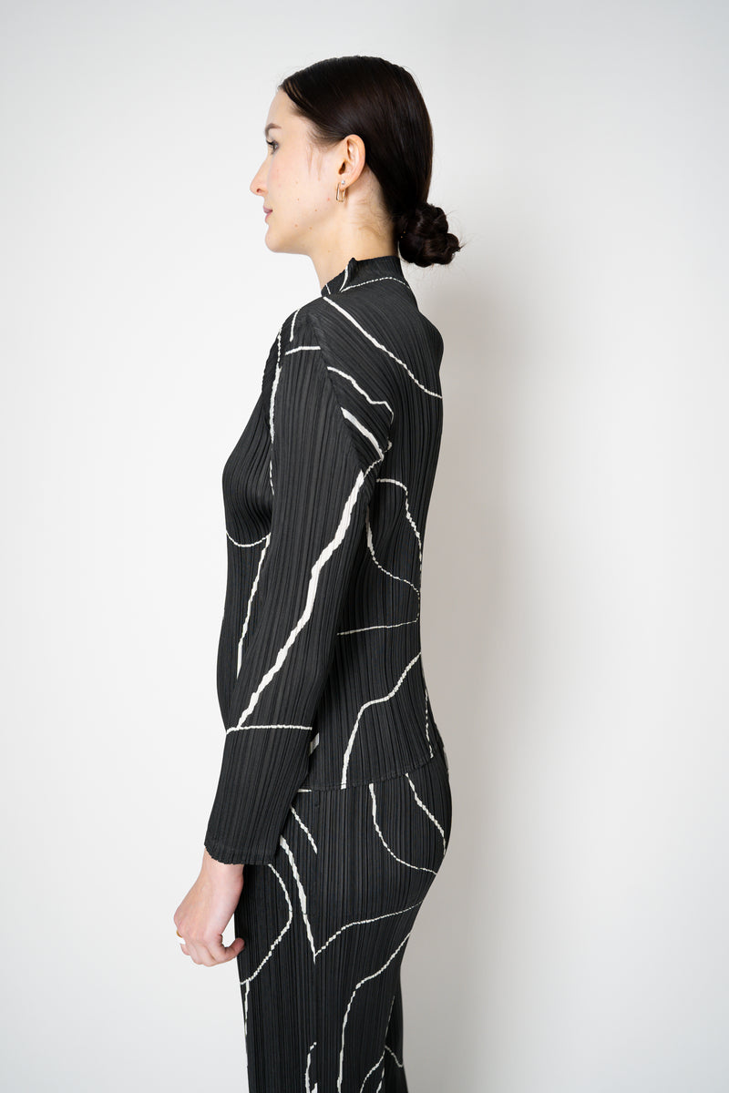Pleats Please Issey Miyake Pause Contrasting Silhouettes High Neck Long Sleeve Top in Black and White Vancouver. Shop Online or in Store.