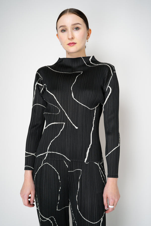 Pleats Please Issey Miyake Pause Contrasting Silhouettes High Neck Long Sleeve Top in Black and White Vancouver. Shop Online or in Store.