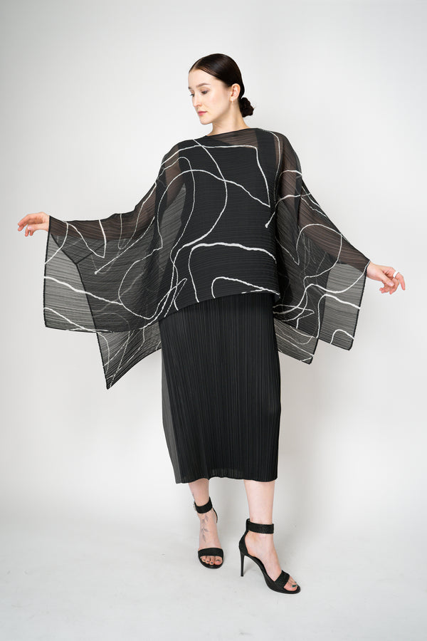 Pleats Please Issey Miyake Pause Contrasting Silhouettes Madame-T in Black and White Vancouver. Shop Online or in Store.