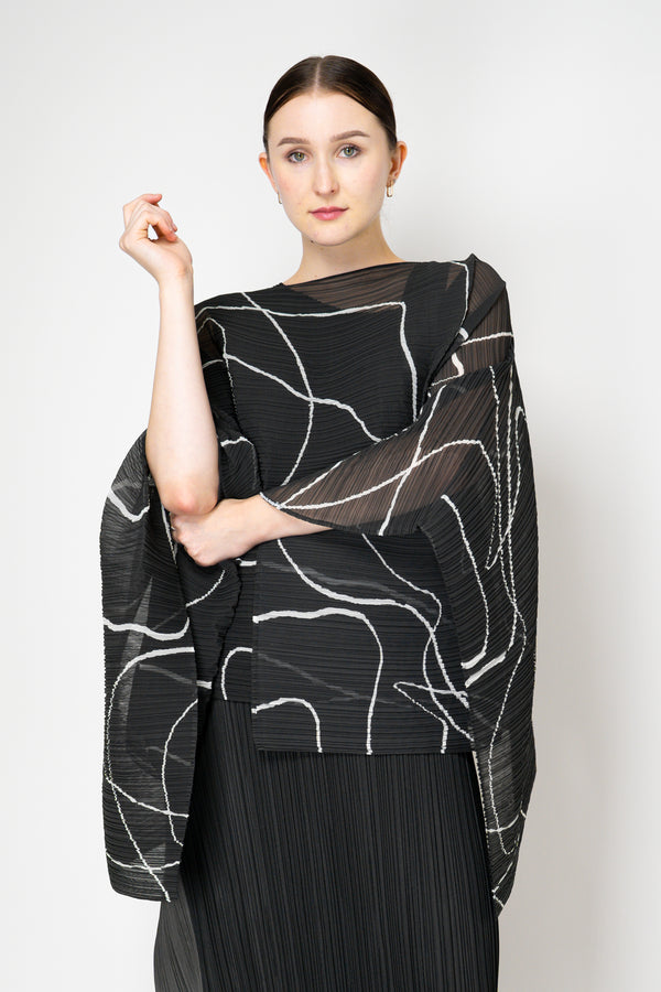 Pleats Please Issey Miyake Pause Contrasting Silhouettes Madame-T in Black and White Vancouver. Shop Online or in Store.