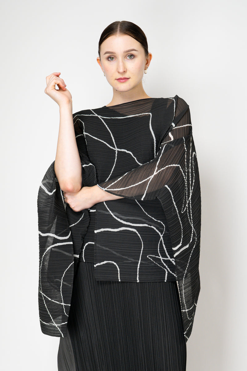 Pleats Please Issey Miyake Pause Contrasting Silhouettes Madame-T in Black and White Vancouver. Shop Online or in Store.