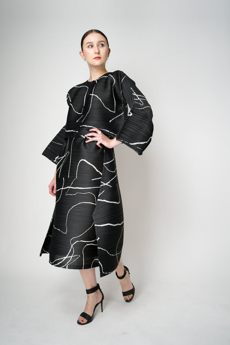 Pleats Please Issey Miyake Pause Contrasting Silhouettes Maxi Skirt in Black and White Vancouver. Shop Online or in Store.