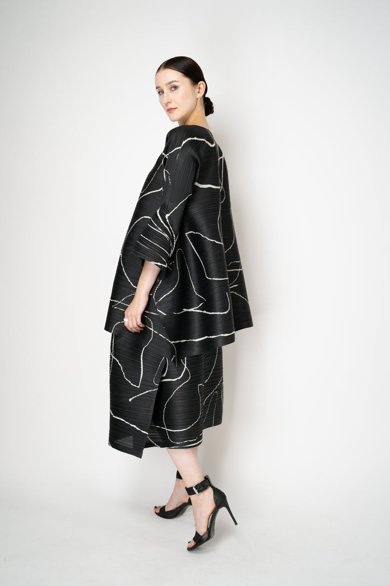 Pleats Please Issey Miyake Pause Contrasting Silhouettes Maxi Skirt in Black and White Vancouver. Shop Online or in Store.