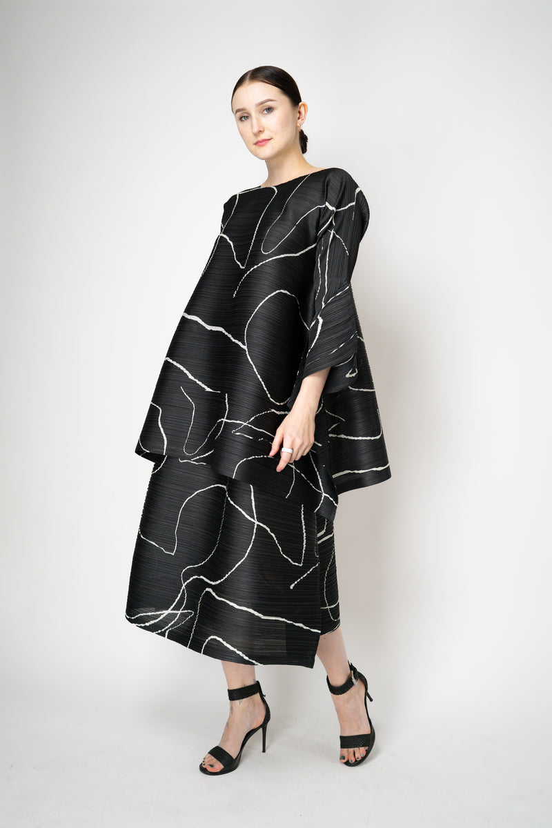 Pleats Please Issey Miyake Pause Contrasting Silhouettes Maxi Skirt in Black and White Vancouver. Shop Online or in Store.