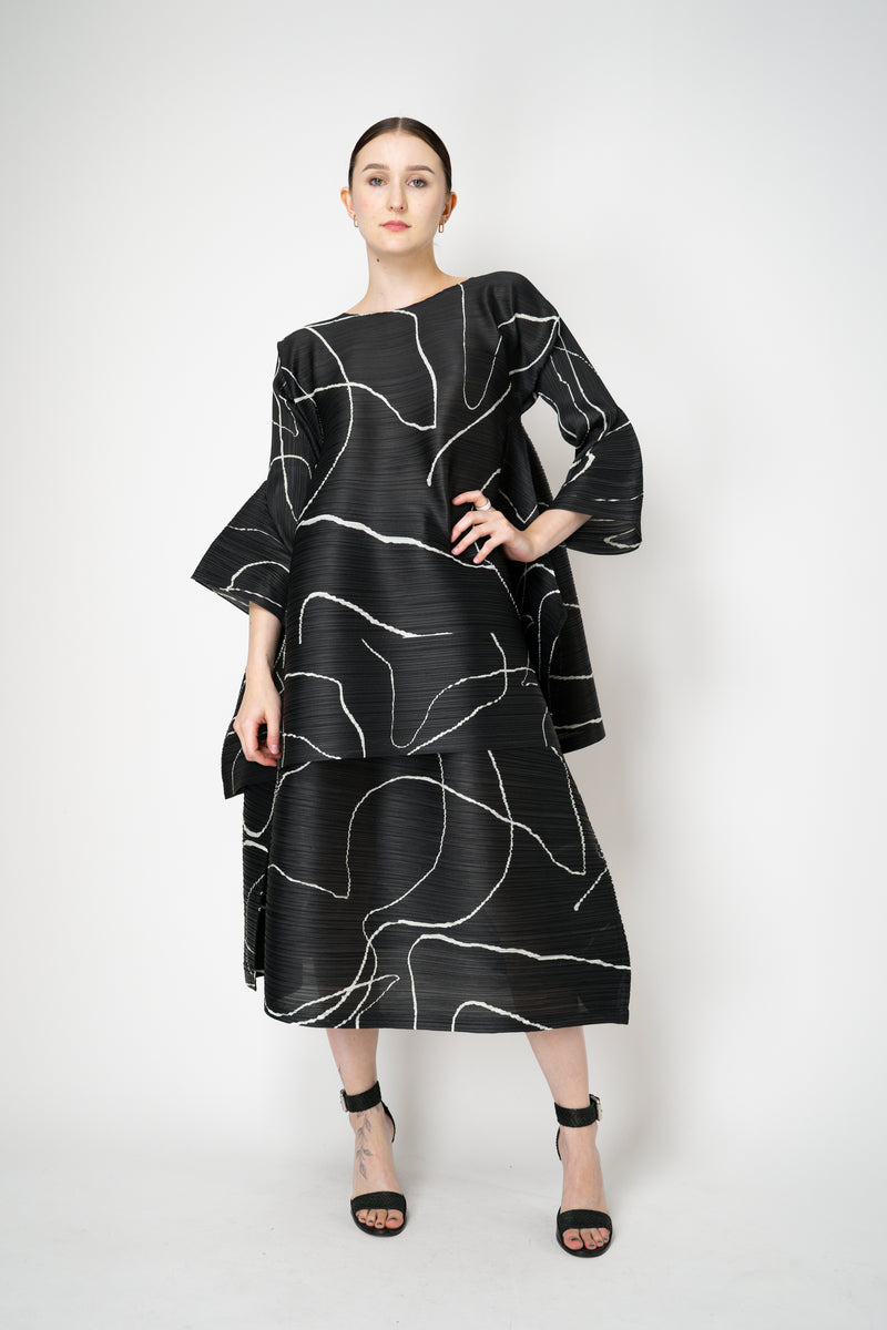 Pleats Please Issey Miyake Pause Contrasting Silhouettes Maxi Skirt in Black and White Vancouver. Shop Online or in Store.