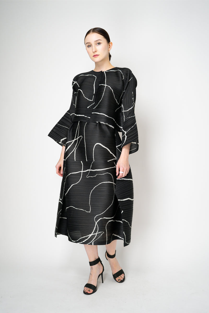 Pleats Please Issey Miyake Pause Contrasting Silhouettes Maxi Skirt in Black and White Vancouver. Shop Online or in Store.