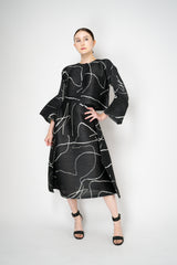 Pleats Please Issey Miyake Pause Contrasting Silhouettes Maxi Skirt in Black and White Vancouver. Shop Online or in Store.