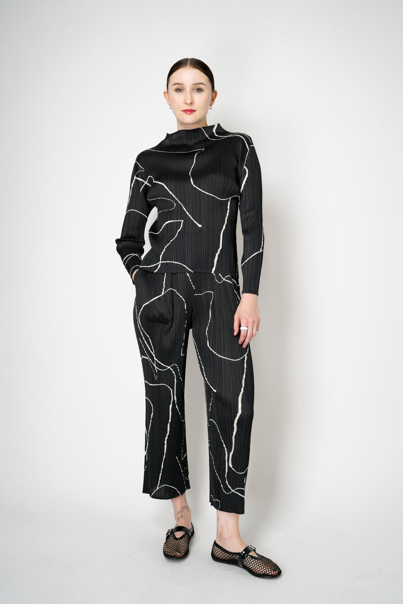 Pleats Please Issey Miyake Pause Contrasting Silhouettes Trousers in Black and White Vancouver. Shop Online or in Store.