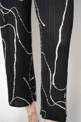 Pleats Please Issey Miyake Pause Contrasting Silhouettes Trousers in Black and White Vancouver. Shop Online or in Store.