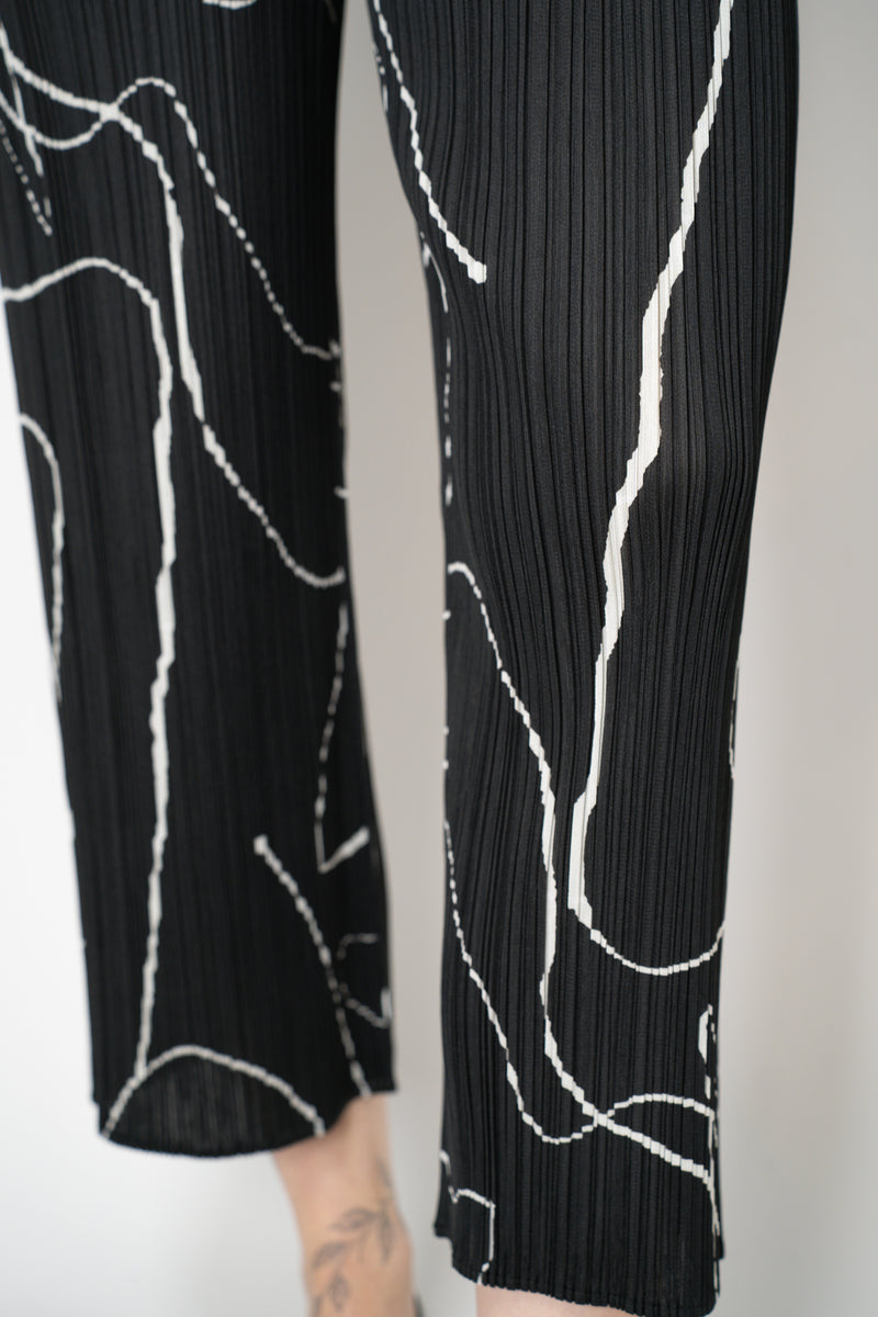 Pleats Please Issey Miyake Pause Contrasting Silhouettes Trousers in Black and White Vancouver. Shop Online or in Store.