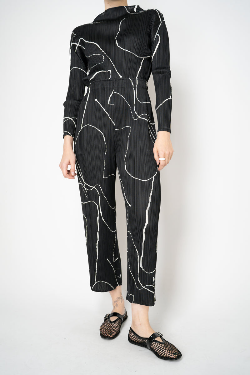 Pleats Please Issey Miyake Pause Contrasting Silhouettes Trousers in Black and White Vancouver. Shop Online or in Store.