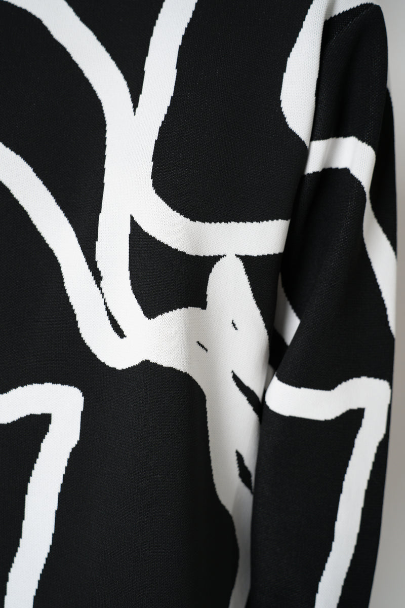 Pleats Please Issey Miyake Pause Knit Contrasting Silhouettes Pullover in Black and White Vancouver. Shop Online or in Store.