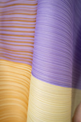 Pleats Please Issey Miyake "Photon" Bounce Tunic in Purple and Yellow Vancouver. Shop Online or in Store.