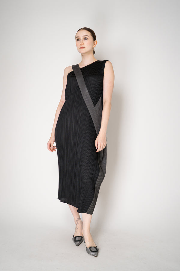 Pleats Please Issey Miyake "Pointe" Asymmetric Layered Dress in Black and Grey Vancouver. Shop Online or in Store.