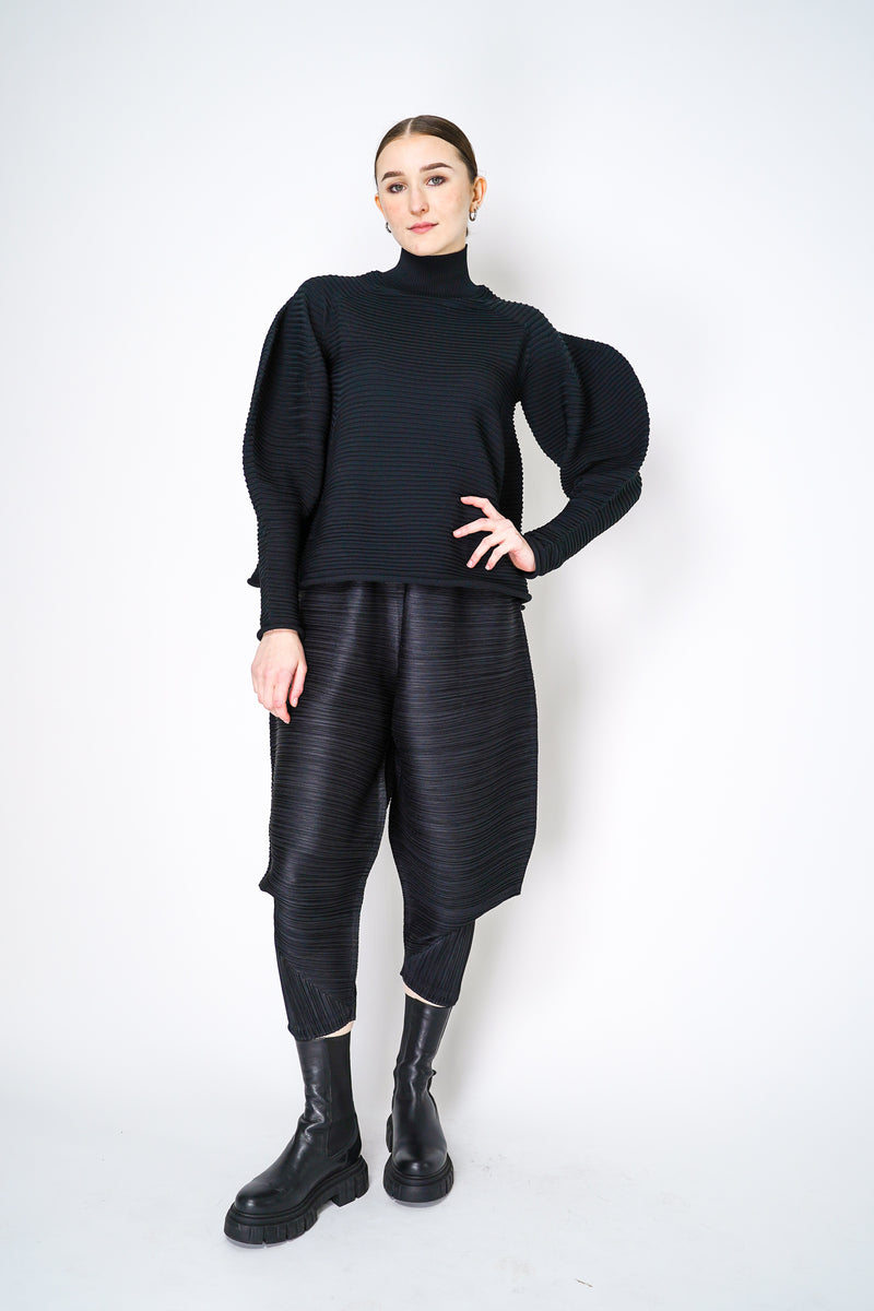 Pleats Please Issey Miyake Powan Knit Puffy Sleeves in Black Vancouver. Shop Online or in Store.