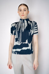 Pleats Please Issey Miyake Refraction Mockneck Shirt in Navy and Pastel Green Print Vancouver. Shop Online or in Store.