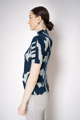Pleats Please Issey Miyake Refraction Mockneck Shirt in Navy and Pastel Green Print Vancouver. Shop Online or in Store.