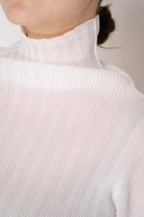 Pleats Please Issey Miyake Rib Pleats Basics Turtleneck in White Vancouver. Shop Online or in Store.
