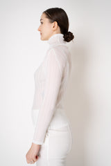 Pleats Please Issey Miyake Rib Pleats Basics Turtleneck in White Vancouver. Shop Online or in Store.