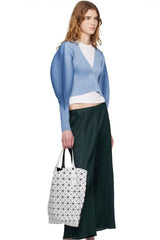 Pleats Please Issey Miyake Rib Pleats December Cropped Bat Sleeves Cardigan in Icy Blue Vancouver. Shop Online or in Store.