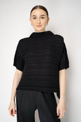 Pleats Please Issey Miyake Sheer Bounce Knit Short Sleeve Top in Black Vancouver. Shop Online or in Store.