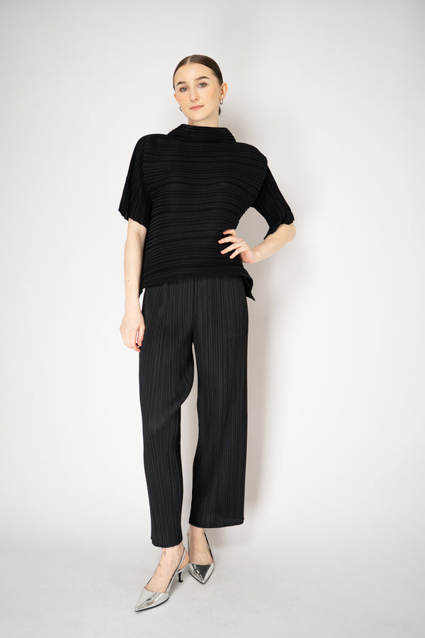 Pleats Please Issey Miyake Sheer Bounce Knit Short Sleeve Top in Black Vancouver. Shop Online or in Store.