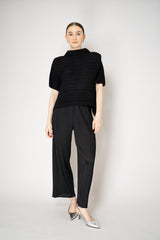 Pleats Please Issey Miyake Sheer Bounce Knit Short Sleeve Top in Black Vancouver. Shop Online or in Store.
