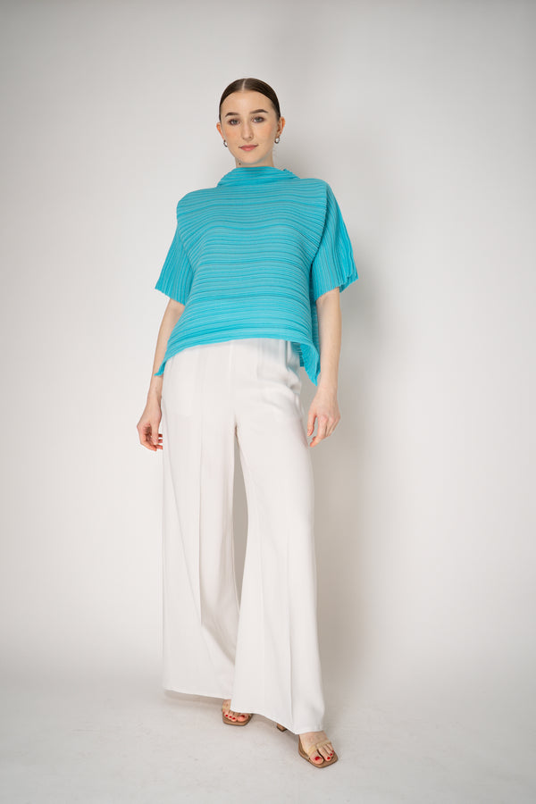 Pleats Please Issey Miyake Sheer Bounce Knit Short Sleeve Top in Turquoise Vancouver. Shop Online or in Store.