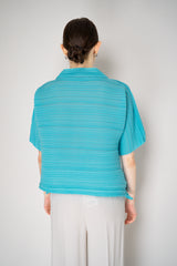 Pleats Please Issey Miyake Sheer Bounce Knit Short Sleeve Top in Turquoise Vancouver. Shop Online or in Store.