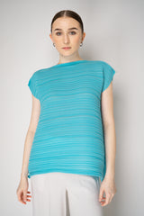 Pleats Please Issey Miyake Sheer Bounce Knit Sleeveless Top in Turquoise Vancouver. Shop Online or in Store.