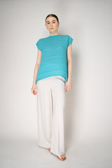 Pleats Please Issey Miyake Sheer Bounce Knit Sleeveless Top in Turquoise Vancouver. Shop Online or in Store.