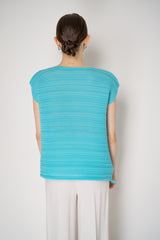 Pleats Please Issey Miyake Sheer Bounce Knit Sleeveless Top in Turquoise Vancouver. Shop Online or in Store.