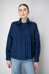 Pleats Please Issey Miyake Smooth Coat in Navy Vancouver. Shop Online or in Store.