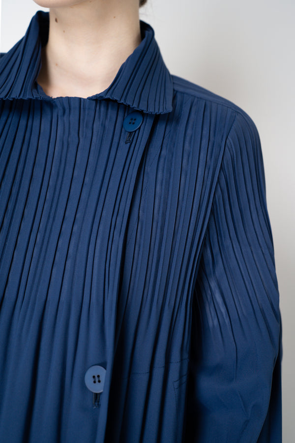 Pleats Please Issey Miyake Smooth Coat in Navy Vancouver. Shop Online or in Store.