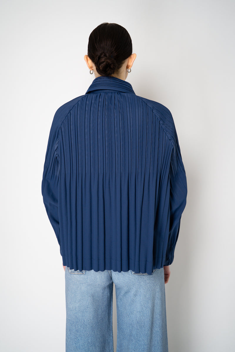 Pleats Please Issey Miyake Smooth Coat in Navy Vancouver. Shop Online or in Store.