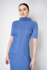Pleats Please Issey Miyake Soft Pleats Turtleneck T-Shirt in Periwinkle Vancouver. Shop Online or in Store.