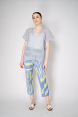Pleats Please Issey Miyake Tatami April V-Neck Mesh Shirt in Pale Blue Vancouver. Shop Online or in Store.