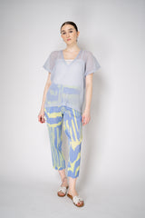 Pleats Please Issey Miyake Tatami April V-Neck Mesh Shirt in Pale Blue Vancouver. Shop Online or in Store.