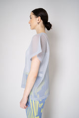 Pleats Please Issey Miyake Tatami April V-Neck Mesh Shirt in Pale Blue Vancouver. Shop Online or in Store.