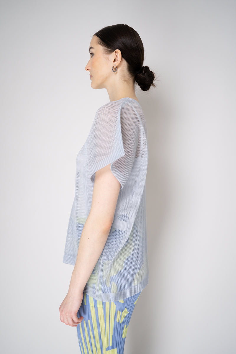 Pleats Please Issey Miyake Tatami April V-Neck Mesh Shirt in Pale Blue Vancouver. Shop Online or in Store.